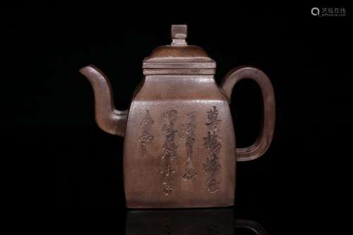 A Zisha Teapot With Potery Carving