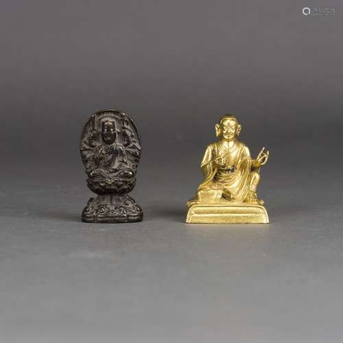 A CHINESE BRONZE FIGURE OF BUDDHA AND A GILT-BRONZE FIGURE OF LUOHAN