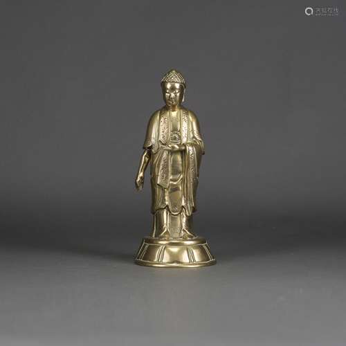 CHINESE GILT-BRONZE FIGURE OF STANDING BUDDHA