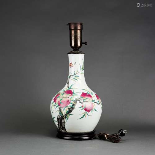 A CHINESE FAMILLE ROSE 'NINE PEACH' BOTTLE VASE, MOUNTED AS A LAMP