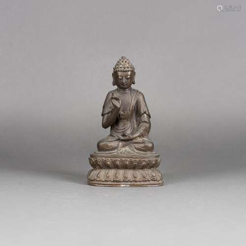 A CHINESE BRONZE FIGURE OF BUDDHA