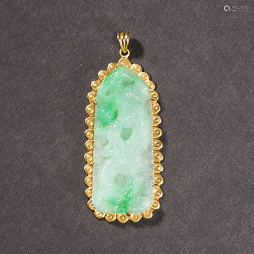 A JADEITE DRAGON PENDANT WITH GOLD DECORATION