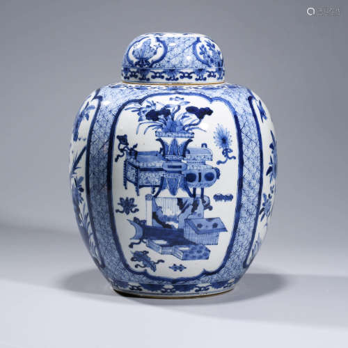 A  BLUE AND WHITE FLORAL JAR WITH COVER