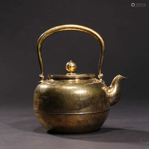 A  GILT-SILVER POT