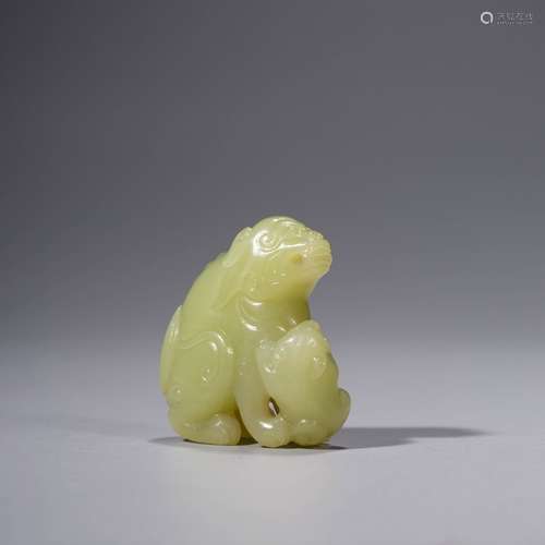 A Topaz  Carved Child-monther Beast Ornament