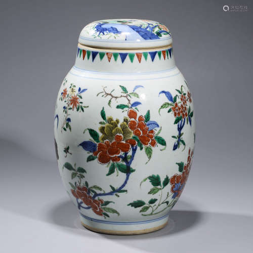 A  FAMILLE-VERTE ‘FLOWER AND BUTTERFLY’ PORCELAIN JAR AND COVER