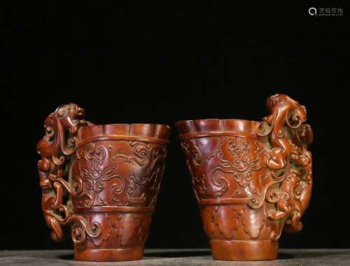 Overseas Backflow. Old Collection. A Pair of Ancient Style Boxwood Cups with Hand-carved Auspicious Animals