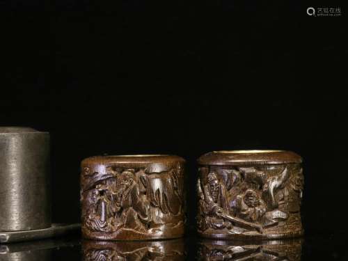 Overseas Backflow. Old Collection. A Pair of Eaglewood Thumb Rings with Gold and Silver Inlays and Hand-carved Figures and Lanscape   (Tin container)