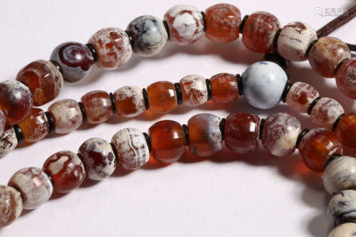 A GROUP OF CHINESE TANG DYNASTY AGATE BEADS