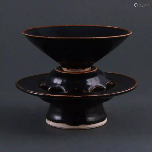 A set of black-glazed bowls and holders from Cizhou