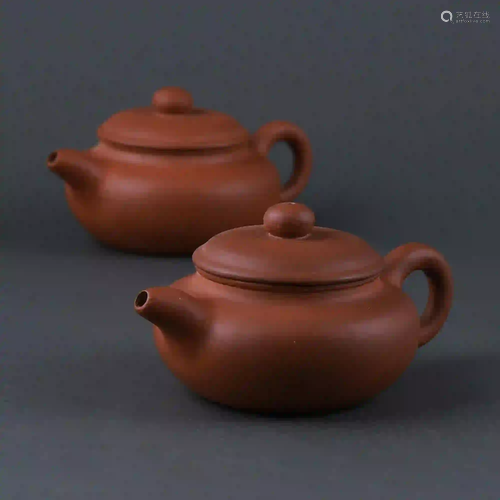 A pair of Yixing teapots