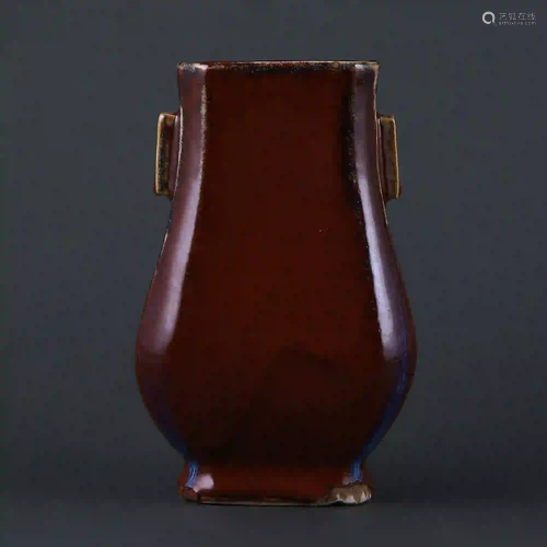 A Lang kiln red-glazed square pierced ear vase