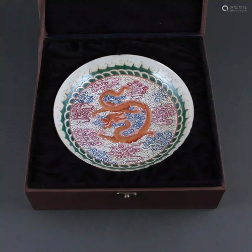 A famille rose red plate with golden cloud and dragon