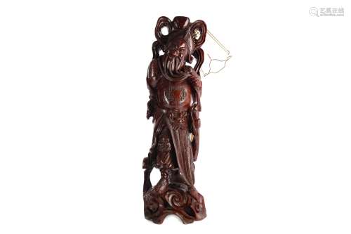 A CHINESE CARVED HARDWOOD FIGURAL LAMP