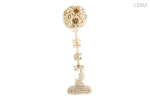 AN EARLY 20TH CENTURY CHINESE IVORY CONCENTRIC BALL ON STAND