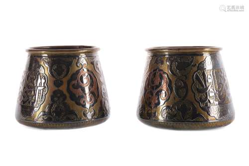 A PAIR OF EASTERN BRASS, COPPER AND SILVER INLAID FERN POTS