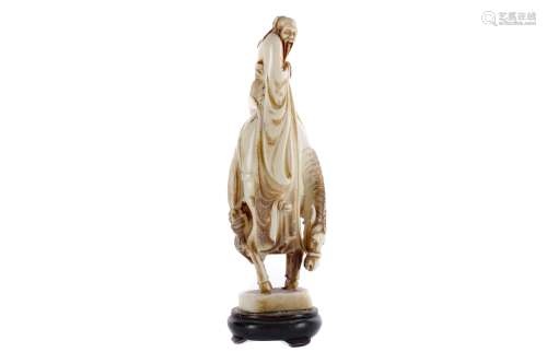 AN EARLY 20TH CENTURY CHINESE CARVED IVORY FIGURE ON HORSEBACK