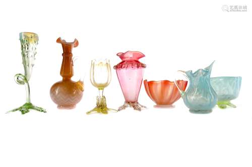 A LATE VICTORIAN URANIUM GLASS VASE ALONG WITH SIX OTHER EXAMPLES