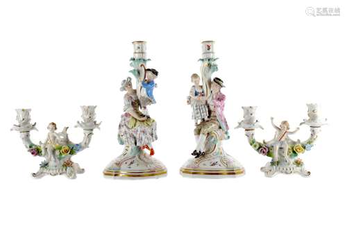 A PAIR OF 19TH CENTURY MEISSEN FIGURAL TABLE CANDLESTICKS