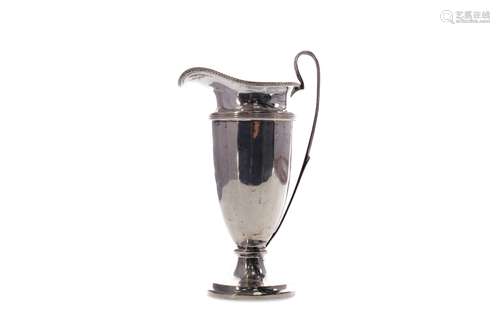 A SILVER CREAM JUG