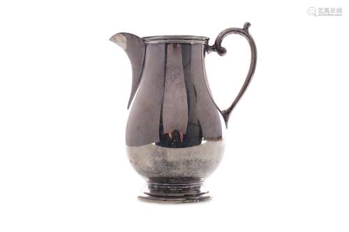 A GEORGE V SILVER CREAM JUG