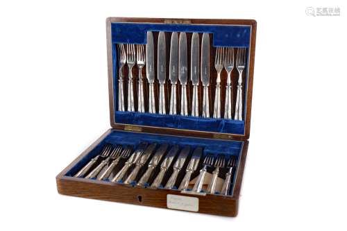 TWO CASE SETS OF FRUIT KNIVES AND FORKS