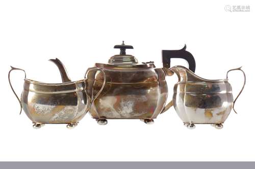 A SILVER THREE PIECE TEA SERVICE