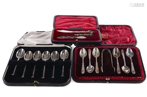 A LOT OF TWO CASED SETS OF SILVER SPOONS AND A SEAL SET