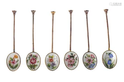 A SET OF SIX SILVER GILT AND ENAMEL COFFEE SPOONS