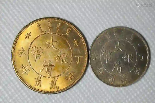 TWO CHINESE OLD SILVER COINS