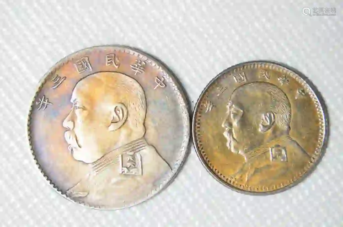 TWO CHINESE OLD SILVER COINS