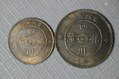 TWO CHINESE OLD SILVER COINS