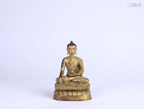 A Gilt Bronze Gautama Buddha Ornament