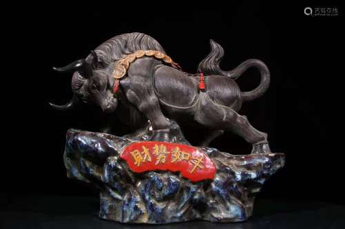 A Porcelain Shiwan Bull Shaped Ornament