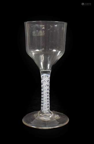 A Glass Goblet, circa 1750, the ogee bowl on an opaque twist stem and circular foot, 21cm high