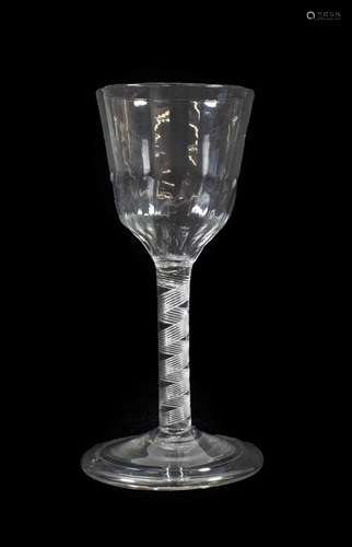 A Wine Glass, circa 1760, the semi-fluted ogee bowl on an air twist stem and folded foot, 16.5cm