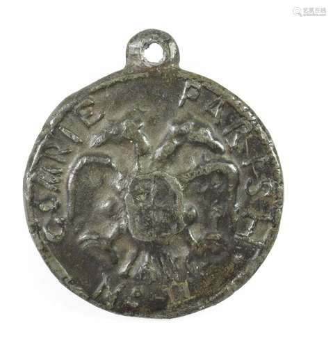 Cumrie, a beggar's badge, of circular form, inscribed CUMRIE PARISH about a double-headed eagle over