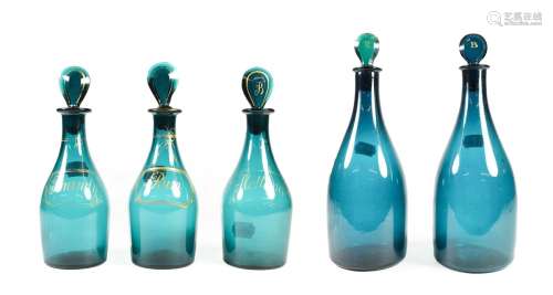 A Matched Set of Three Green Glass Spirit Decanters and Stoppers, early 19th century, of mallet