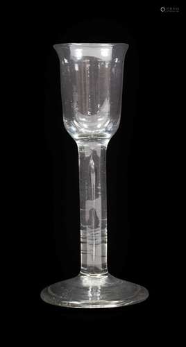 A Cordial Glass, circa 1750, the rounded cylindrical bowl with everted rim on plain stem with