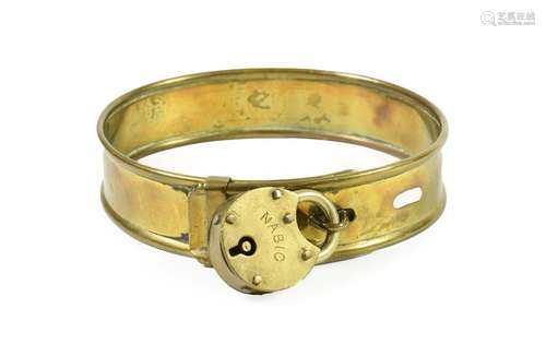 A Brass Dog Collar, mid 19th century, with rolled edges and brass padlock inscribed MABIG, 11cm