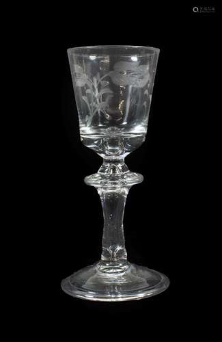 A Hessen Wine Glass, mid 18th century, the rounded bucket bowl engraved with foliage on a knopped