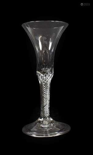 A Wine Glass, circa 1760, the bell shaped bowl on an air twist stem and folded foot, 20cm high