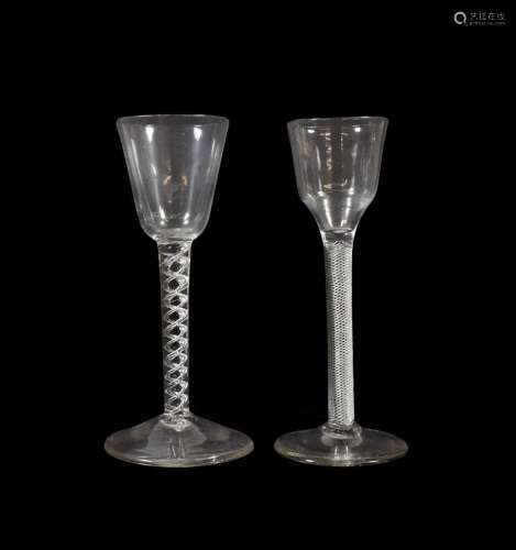 A Wine Glass, circa 1750, the rounded funnel bowl on an air twist stem and circular foot, 16cm high;