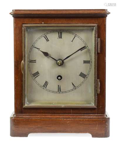 A German Mahogany Table Timepiece, circa 1900, flat top pediment, bevelled side glass panels, 5-inch