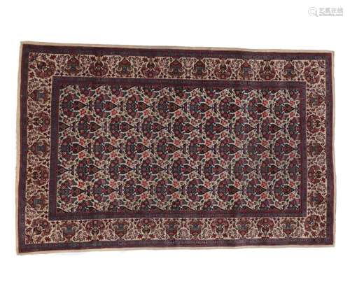 Fine and Unusual Kashan Rug Central Iran, circa 1930 The ivory field with a oneway design of urns