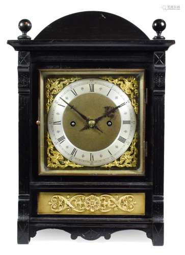 A German Quarter Striking Mantel Clock, circa 1890, arched case, gilt metal floral decorated front