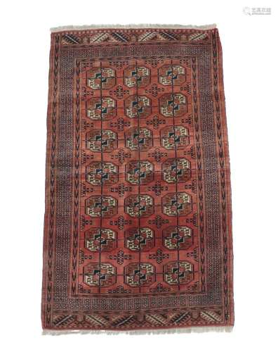 Tekke Rug Probably Merve, circa 1920 The madder field with three rows of quartered güls enclosed