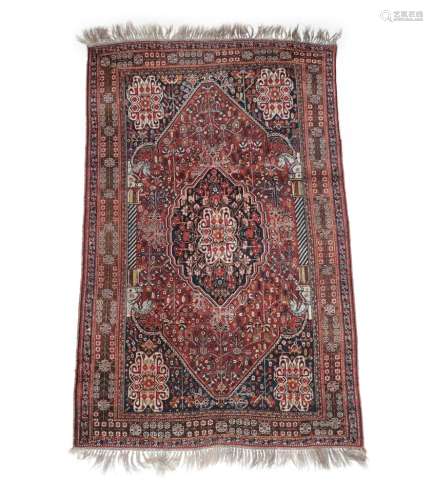 Kashgai Rug South West Iran, circa 1930 The chestnut brown field of angular plants flanked by