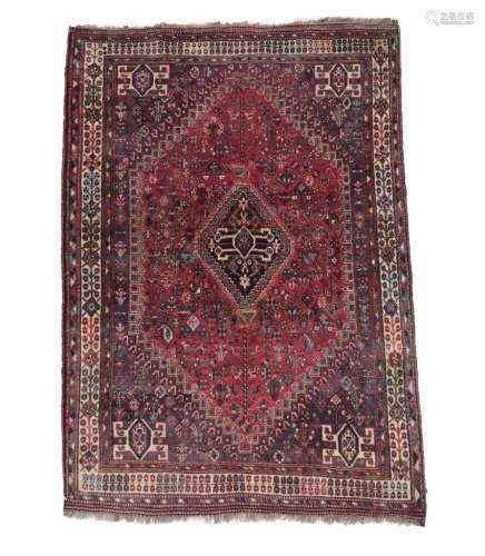 Kashgai Rug South West Iran, circa 1960 The raspberry field of zoomorphic and tribal devices