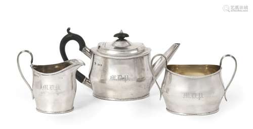 A Three-Piece Victorian Silver Tea-Service, by Thomas Bradbury, London, 1891, each piece oval and